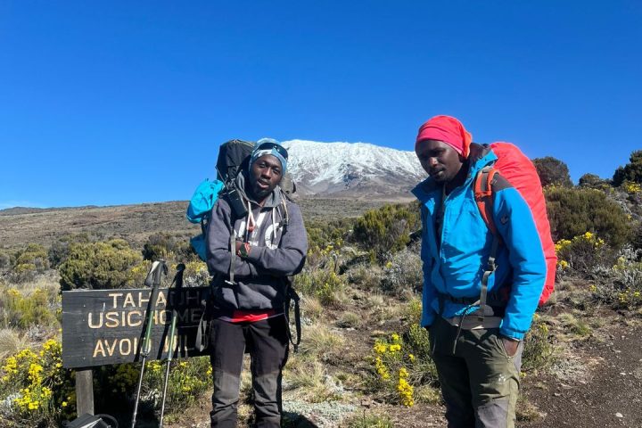 Bee Adventure Safari porters on the Way